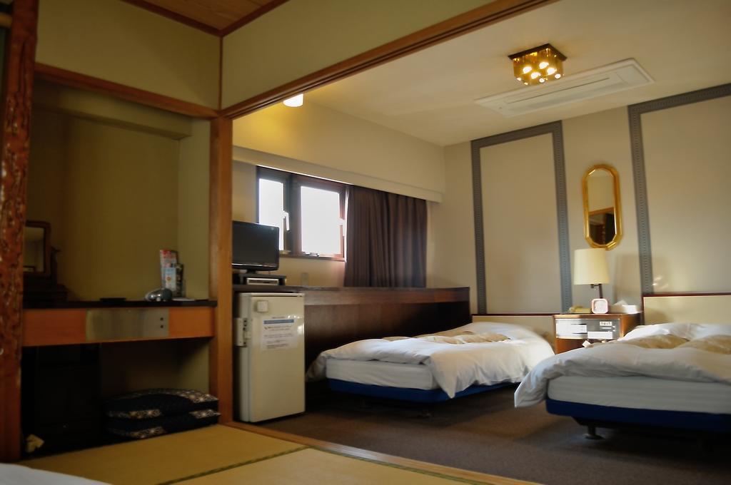 Hotel Los Inn Kochi Quarto foto