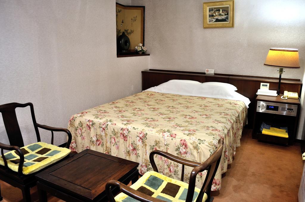 Hotel Los Inn Kochi Quarto foto