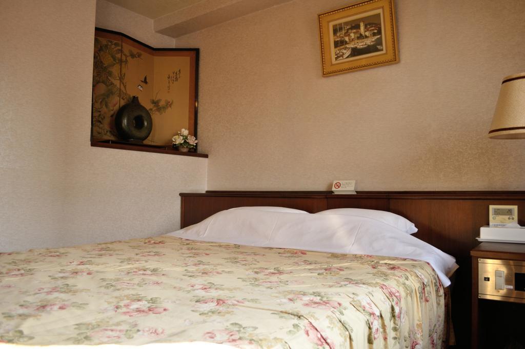 Hotel Los Inn Kochi Quarto foto
