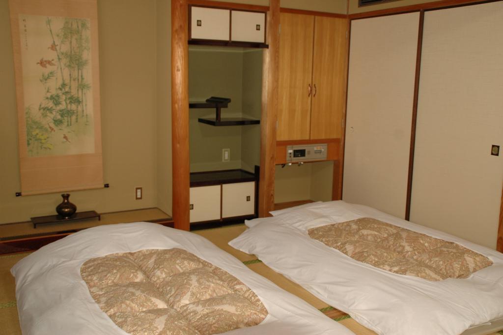 Hotel Los Inn Kochi Quarto foto