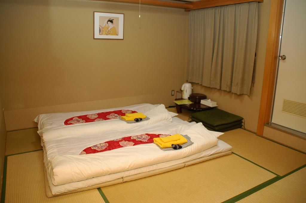 Hotel Los Inn Kochi Quarto foto