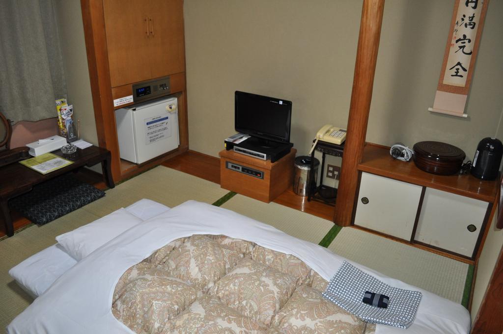 Hotel Los Inn Kochi Quarto foto